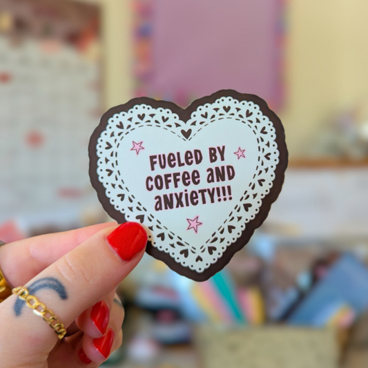Fueled by coffee and anxiety matte sticker